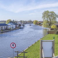 Buy canvas prints of Potter Heigham Over Looking River Thurne by James Taylor