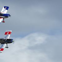 Buy canvas prints of Abingdon Air Show small stunt planes fly by  by Alan Rampton Photography