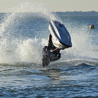 Buy canvas prints of jet ski stunt on the water by nick wastie