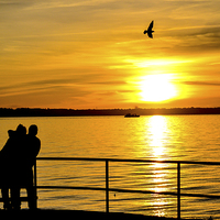 Buy canvas prints of lovers at sunset by nick wastie