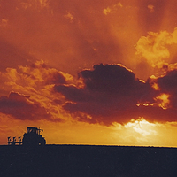 Buy canvas prints of Sunset Ploughing in Caradon by Roger Upton