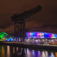Buy canvas prints of Vibrant Glasgow Nightscape by Tommy Dickson