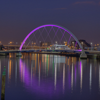 Buy canvas prints of Clyde Arc, Glasgow at night. by Tommy Dickson