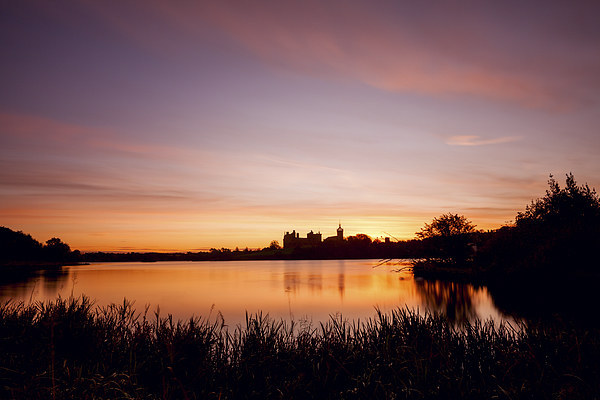 Tranquil Sunrise Over Linlithgow Palace Picture Board by Tommy Dickson