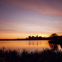 Buy canvas prints of Tranquil Sunrise Over Linlithgow Palace by Tommy Dickson