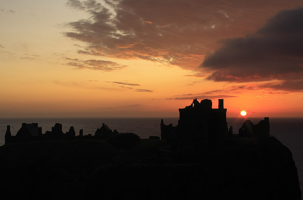 Majestic Sunrise at Dunnottar Castle Picture Board by Tommy Dickson