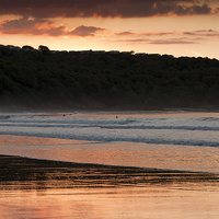 Buy canvas prints of Riding the Waves at Cayton Bay by Tommy Dickson