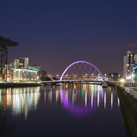 Buy canvas prints of Glasgows Shimmering Squinty Bridge by Tommy Dickson
