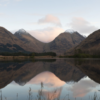 Buy canvas prints of Sunrise in the Scottish Highlands by Tommy Dickson