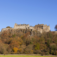 Buy canvas prints of Majestic Stirling Castle in Autumn by Tommy Dickson