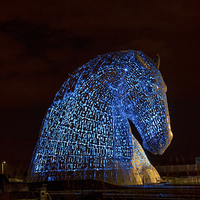 Buy canvas prints of The Illuminated Beauty of The Kelpies by Tommy Dickson
