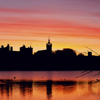 Buy canvas prints of Majestic Sunrise Over Linlithgow Palace by Tommy Dickson