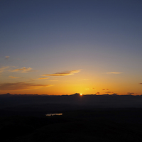 Buy canvas prints of Majestic Sunset Over Ben Ledi by Tommy Dickson