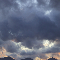 Buy canvas prints of Arrochar Alps at Sunset by Tommy Dickson