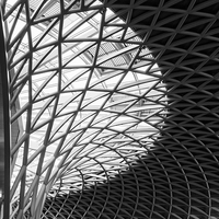 Buy canvas prints of  Kings Cross Station Concourse. by Tommy Dickson