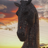 Buy canvas prints of  One of the magnificent Kelpie sculptures, near Fa by Tommy Dickson