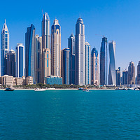 Buy canvas prints of Dubai Marina Skyline. by Tommy Dickson