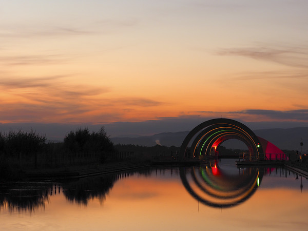 Falkirk Wheel at sunset. Picture Board by Tommy Dickson