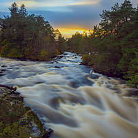 Buy canvas prints of Vibrant Sunset at Falls of Dochart by Tommy Dickson