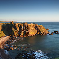 Buy canvas prints of Sunrise over Dunnottar Castle by Tommy Dickson