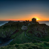 Buy canvas prints of Dunnottar Castle at sunrise.                       by Tommy Dickson