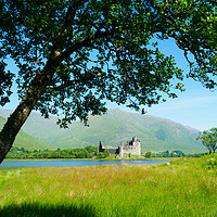 Buy canvas prints of Kilchurn Castle from the banks of Loch Awe. by Tommy Dickson