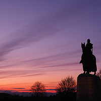 Buy canvas prints of Robert the Bruce statue at sunset. by Tommy Dickson