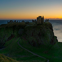Buy canvas prints of Dunnottar Castle at Sunrise. by Tommy Dickson