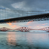 Buy canvas prints of The Forth Rail Bridge framed by the Forth Road Bridge. by Tommy Dickson