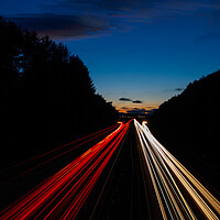 Buy canvas prints of Motorway Light Trails. by Tommy Dickson