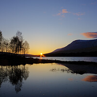 Buy canvas prints of Serene Sunrise Over Loch Tulla by Tommy Dickson
