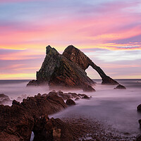 Buy canvas prints of Sunrise at Bow Fiddle Rock by Tommy Dickson