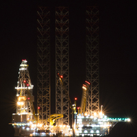 Buy canvas prints of Oil rig at night by caroline henderson