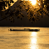 Buy canvas prints of Sunset over the Mekong River by Lucy Pinkstone