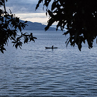 Buy canvas prints of Twilight on Lake Toba, Sumatra by Lucy Pinkstone