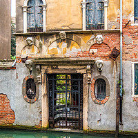 Buy canvas prints of Back street canal in venice by Paul Nicholas