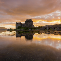 Buy canvas prints of  Eilean Donan Castle, Scotland at sunset by Daugirdas Racys