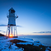 Buy canvas prints of Sunset at Black Nore Point Lighthouse in winter by Daugirdas Racys