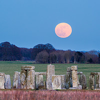 Buy canvas prints of Super Moon rising over Stonehenge stone circle by Daugirdas Racys