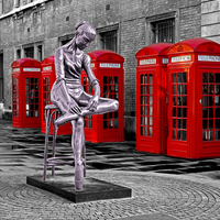 Buy canvas prints of Red phone boxes & ballet statue by Kenneth Dear