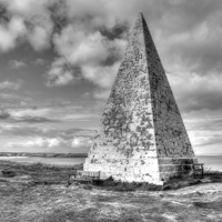 Buy canvas prints of Pyramids on Lindisfarne by Terry Dutchburn