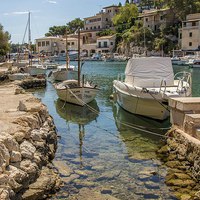 Buy canvas prints of Harbour, Cala Figuera by Mark Bangert