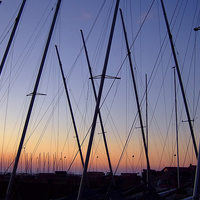 Buy canvas prints of Masts at sunset by John B Walker LRPS