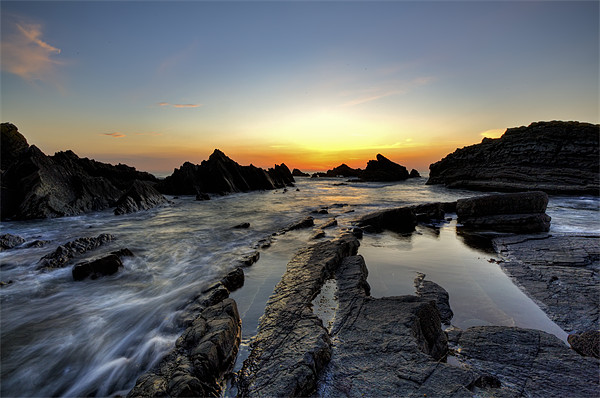 Serene Sunset at Hartland Quay Picture Board by Mike Gorton