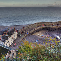 Buy canvas prints of Picturesque Clovelly Harbour by Mike Gorton