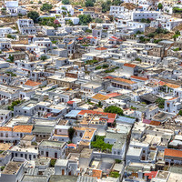 Buy canvas prints of Lindos Rooftops and Streets by Mike Gorton