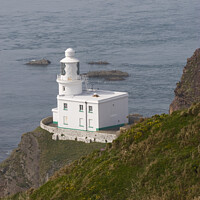 Buy canvas prints of Hartland Point Lighthouse North Devon by Mike Gorton