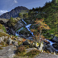 Buy canvas prints of Tryfan And The Ogwen Waterfall Snowdonia by Darren Wilkes
