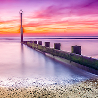 Buy canvas prints of A Glowing Sunset at Rhyl Beach by Darren Wilkes