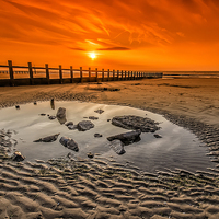 Buy canvas prints of Splash Point Sunset Wales by Darren Wilkes
